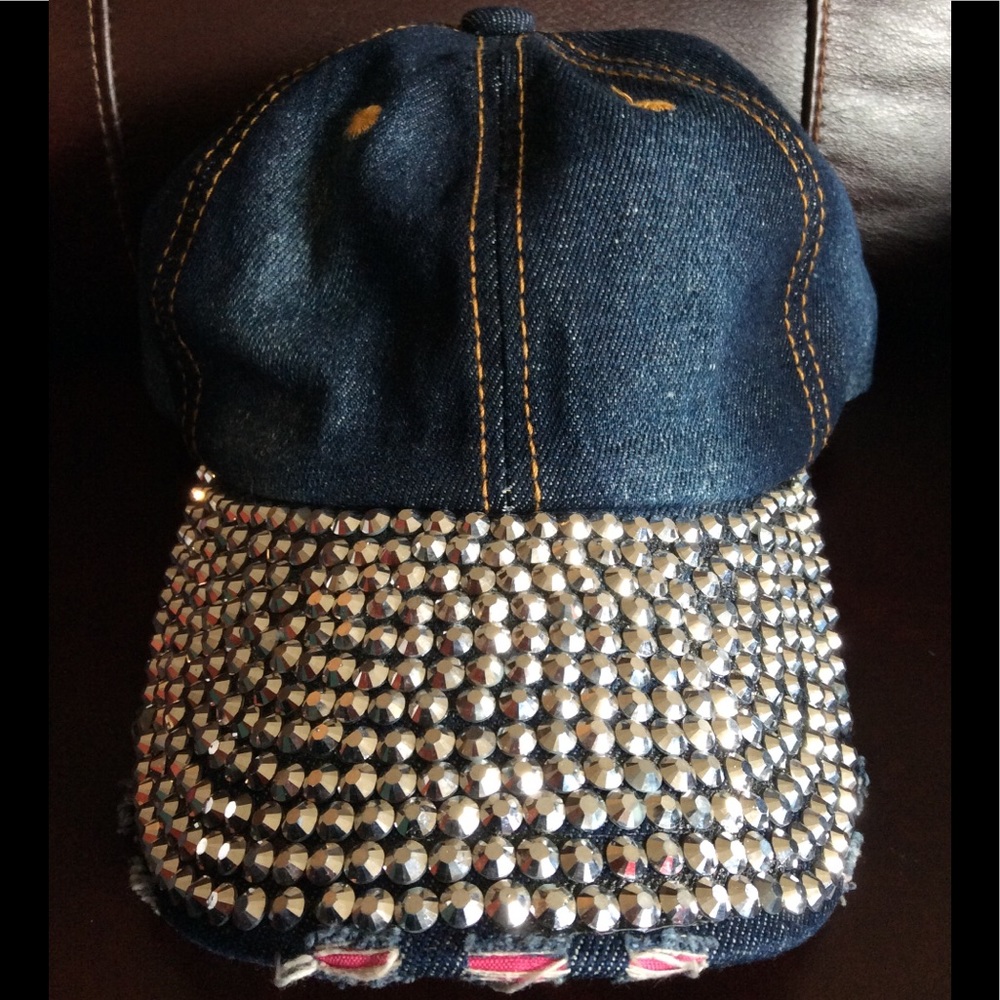 A NEW BLUE JEAN CAP WITH LOTS OF BLING